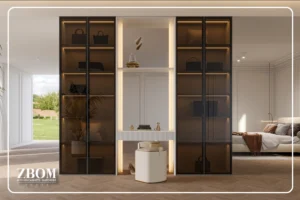 Modern built-in wardrobes with glass doors and warm LED lighting in a Dubai bedroom